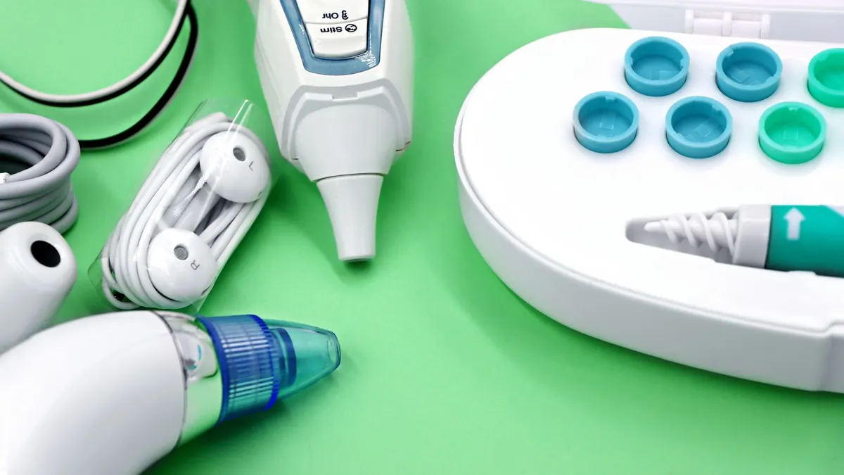 A variety of ear care devices including ear buds, medical instruments, and cleaning tools.